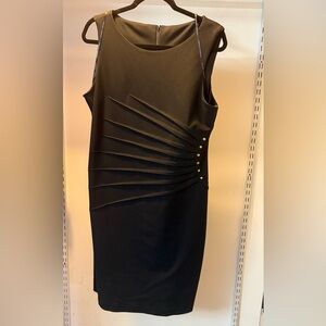 Classic Black Sleeveless Sheath Dress with Side Pleat Detail